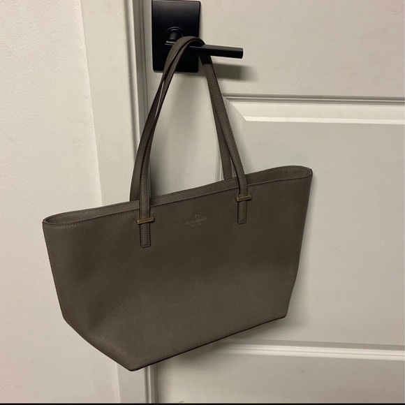Gray Kate spade, never used. Lining has no stains. - Picture 1 of 5